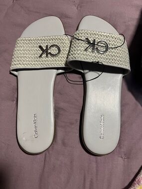Calvin Klein Cream Woven Slide Sandals with Metallic CK Logo